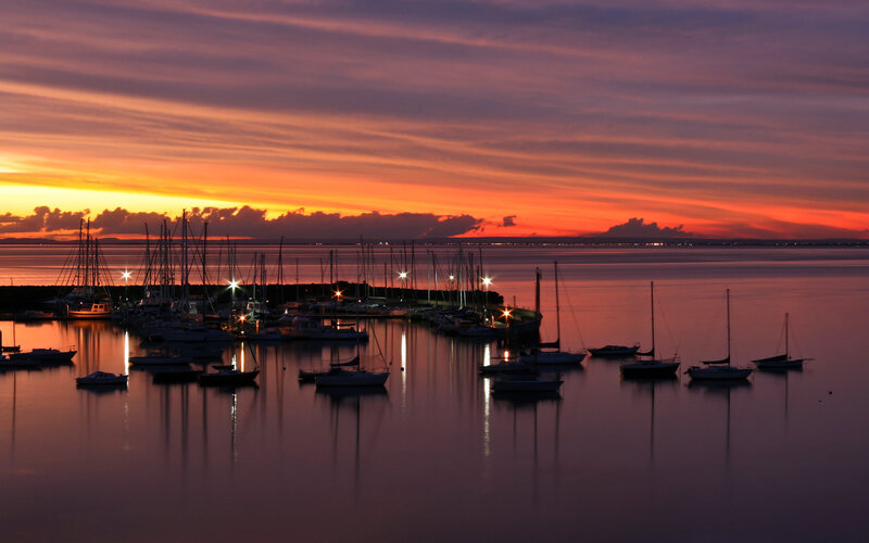 Sailboats in Harbor — Orange, Serene, Sunset, Photograph, Sky, Water, Lights