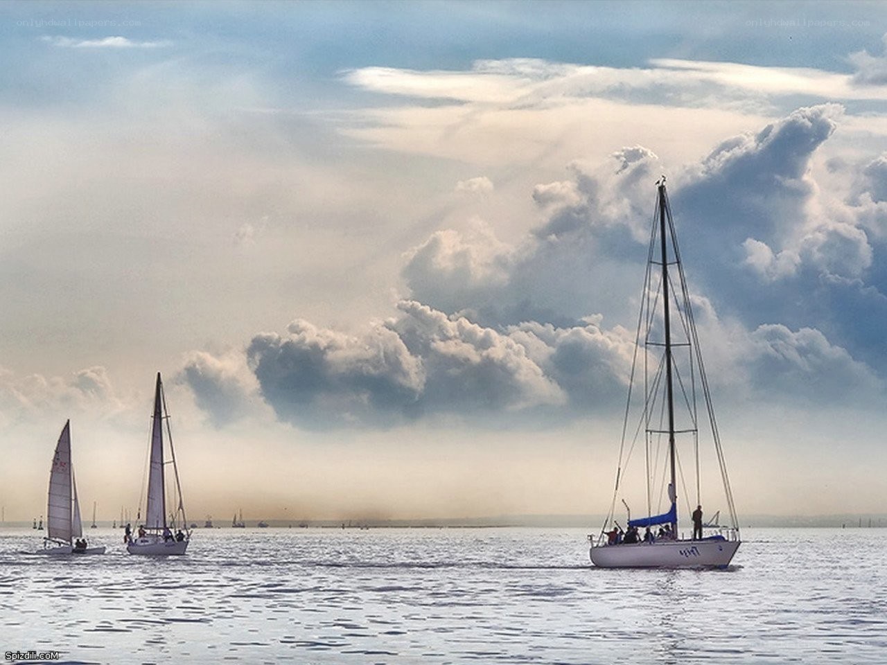 Sailboats on a cloudy day