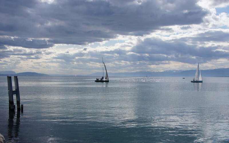 Sailboats on a Lake — Blue, Serene, Afternoon, Photograph, Mountains, Clouds