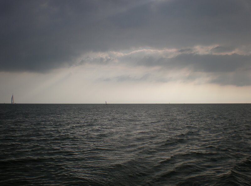 Sailboats on a stormy sea