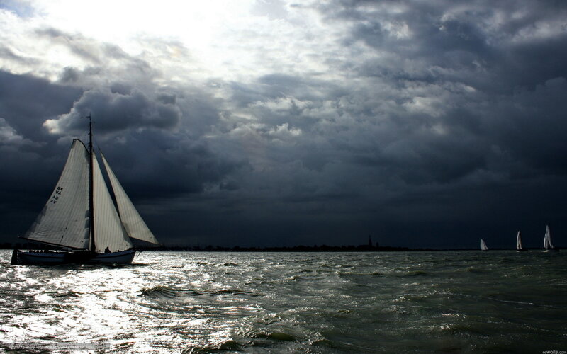 Sailboats on a stormy sea