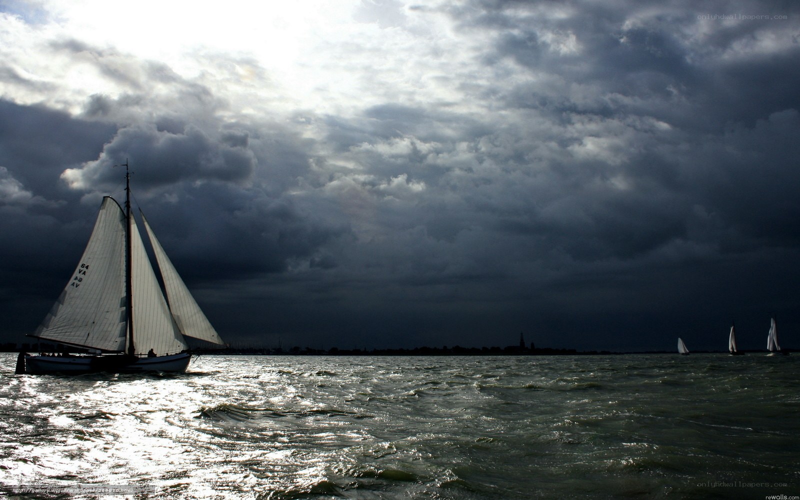 Sailboats on a stormy sea