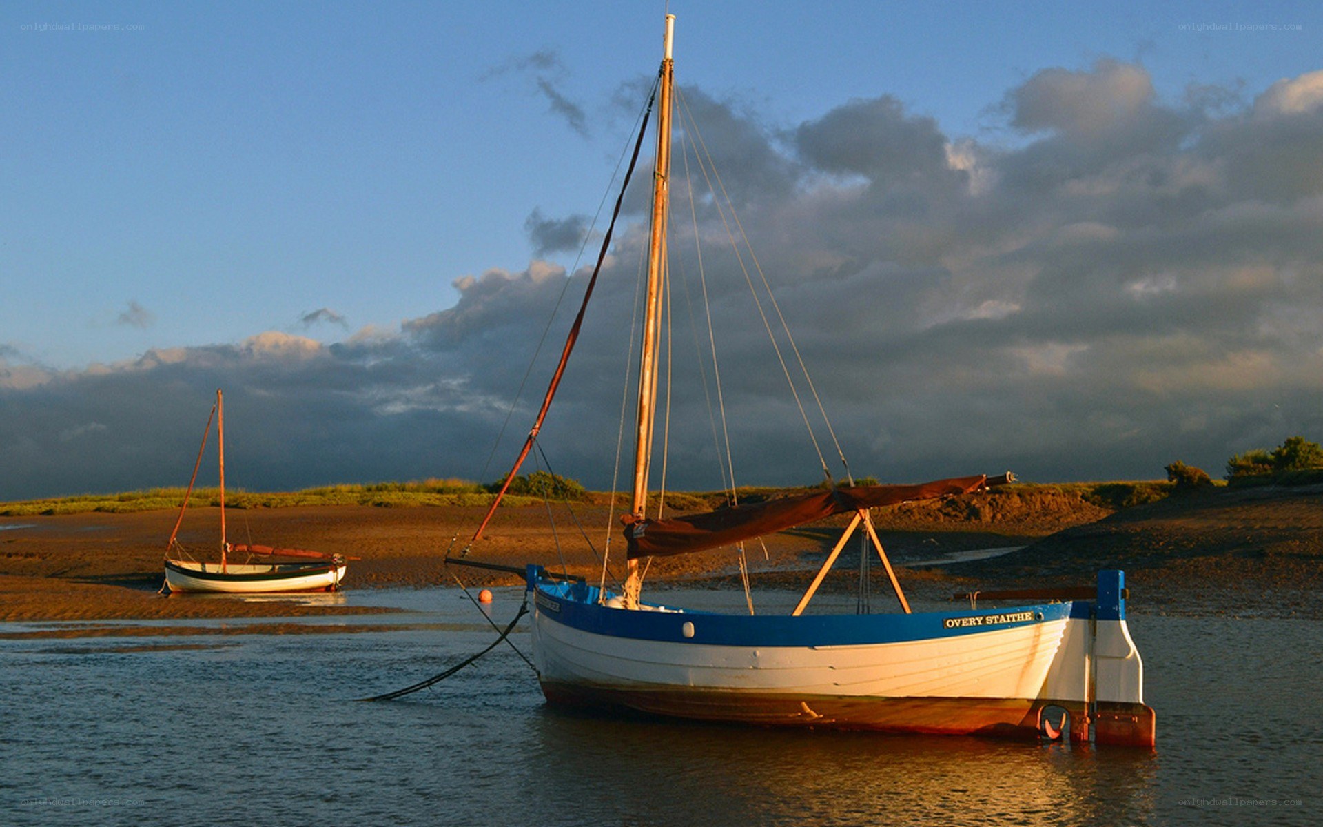 Sailboats on a tidal flat