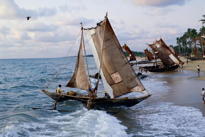 Sailboats on a tropical beach