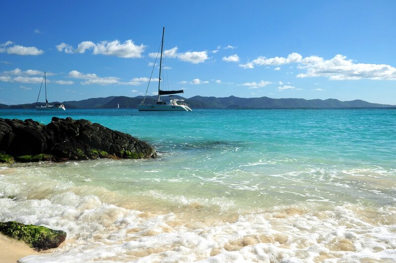 Sailboats on a tropical beach