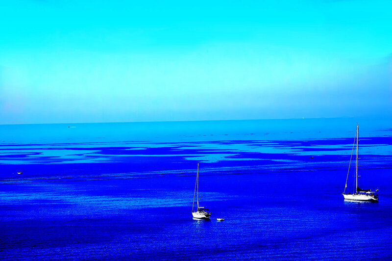 Sailboats on Blue Water