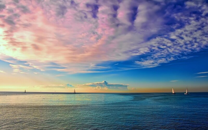 Sailboats on Calm Sea — Blue, Serene, Sunset