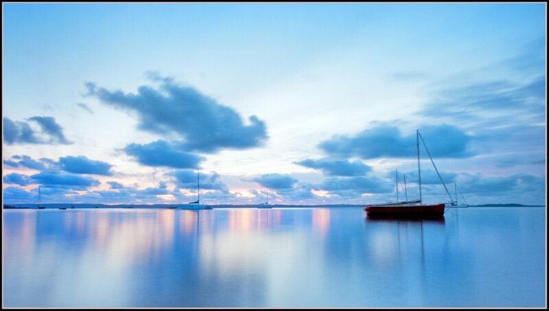 Sailboats on Calm Water — Blue, Serene
