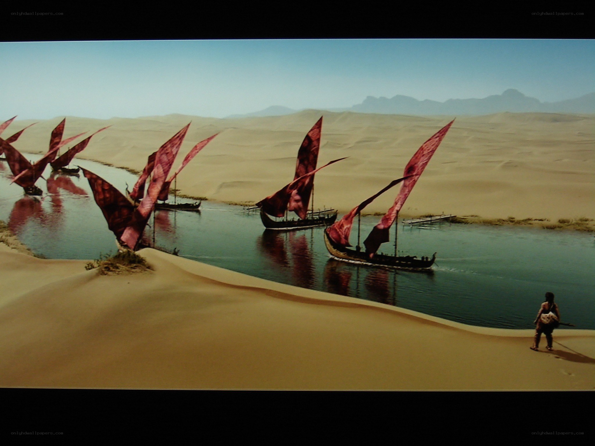 sailboats on desert river