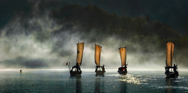 Sailboats on Misty Lake