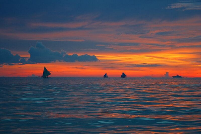 Sailboats on Ocean — Orange, Serene, Sunset