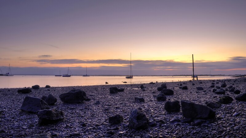 Sailboats on Pebble Beach — Purple