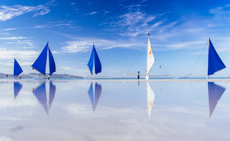 Sailboats on Reflective Water
