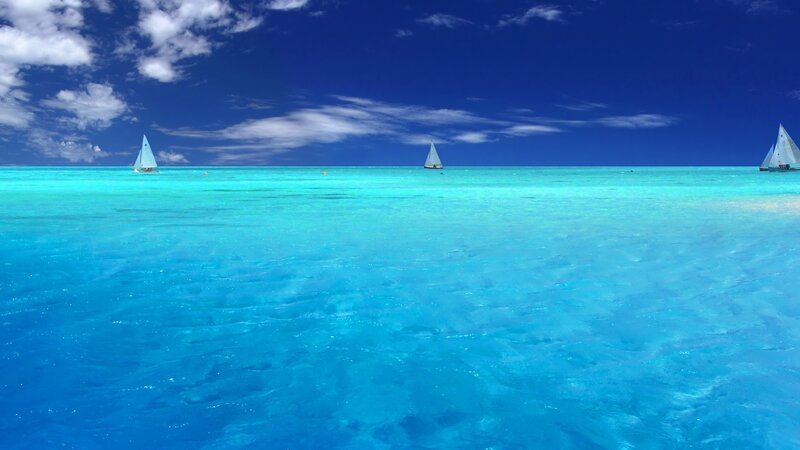 Sailboats on turquoise sea