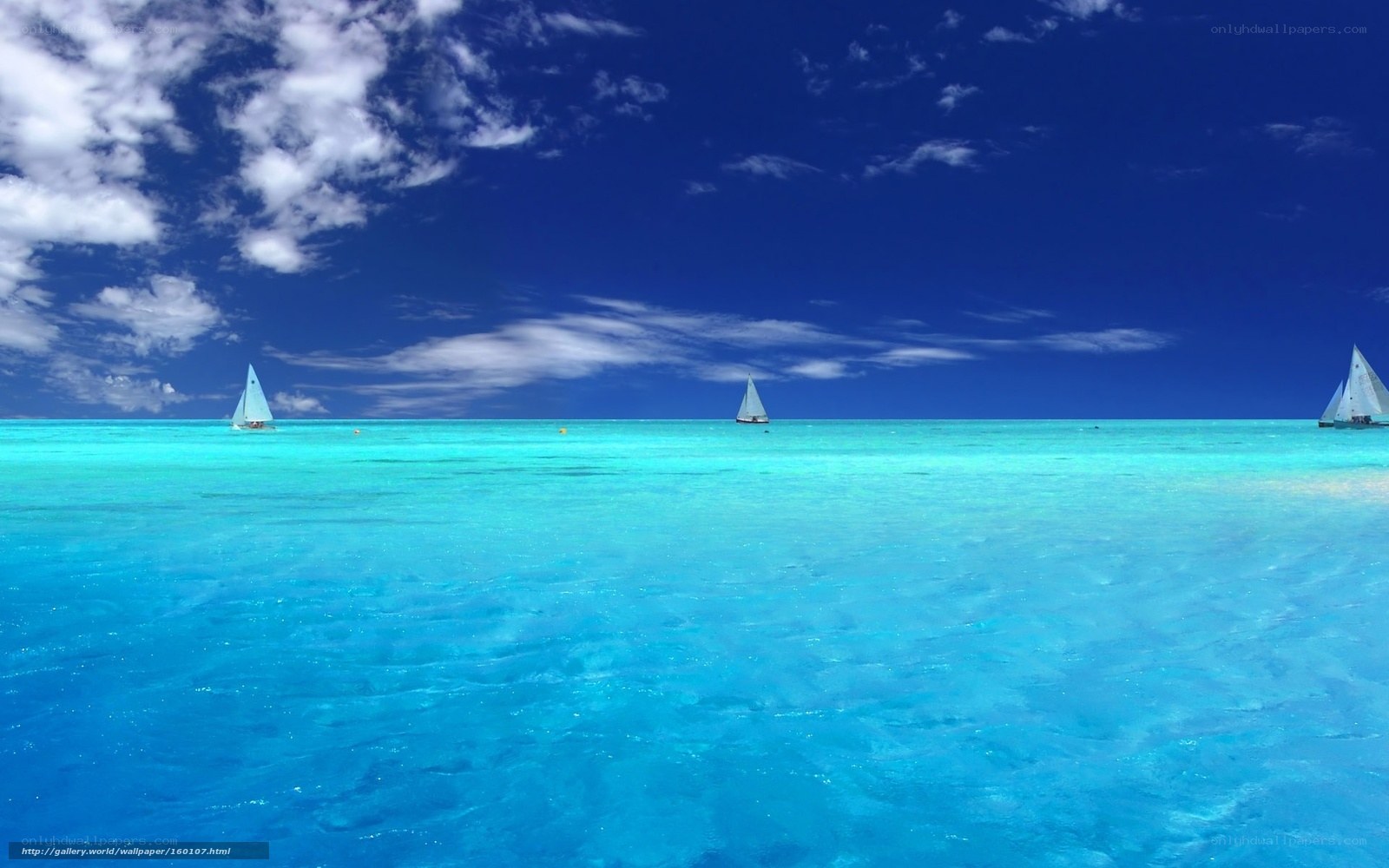 Sailboats on turquoise sea