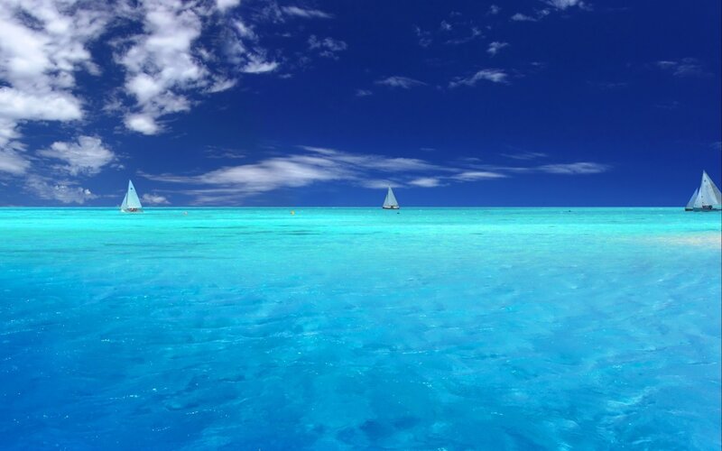 Sailboats on turquoise sea