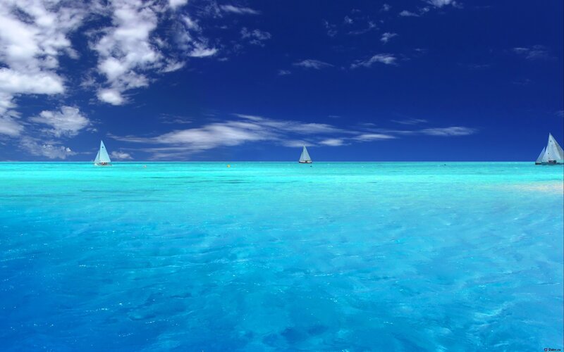sailboats on turquoise sea