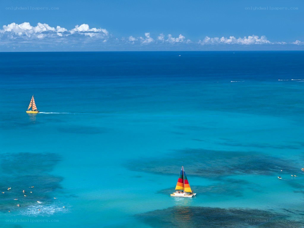 Sailboats on turquoise water
