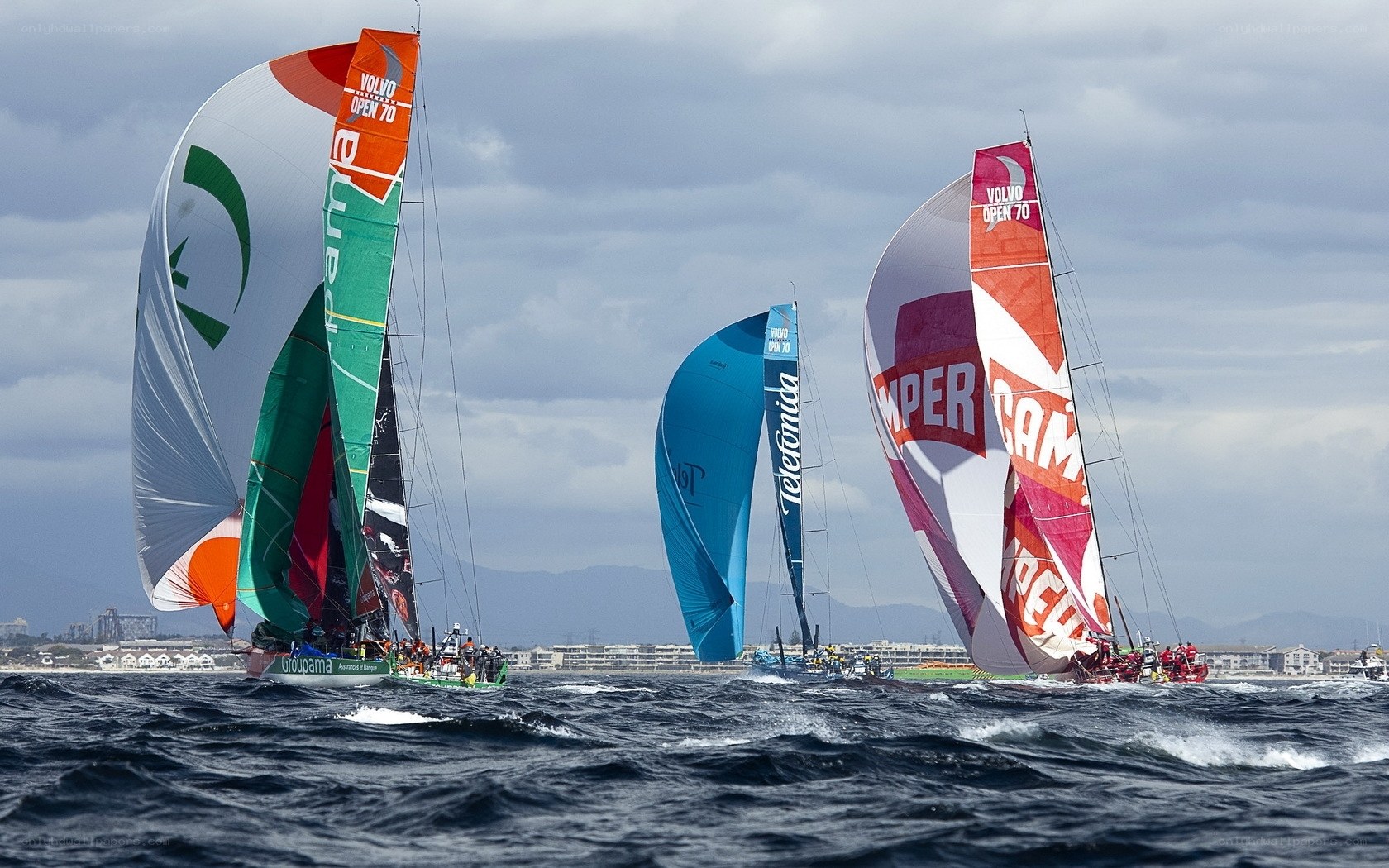Sailboats racing in Volvo Open 70