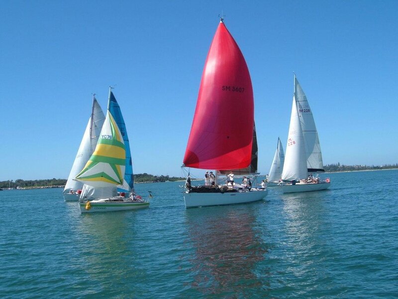 Sailboats racing on a sunny day