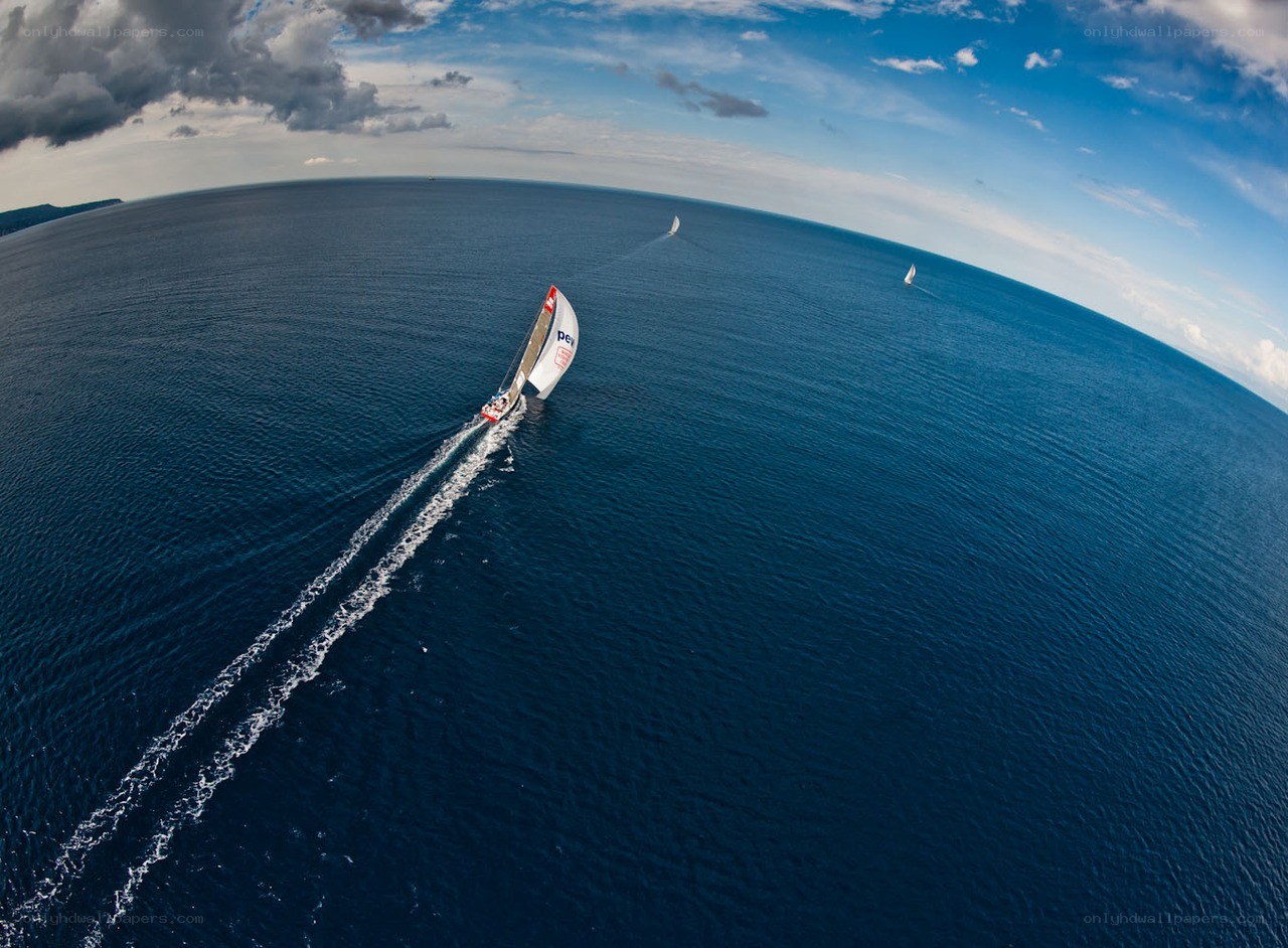 Sailboats racing on open sea