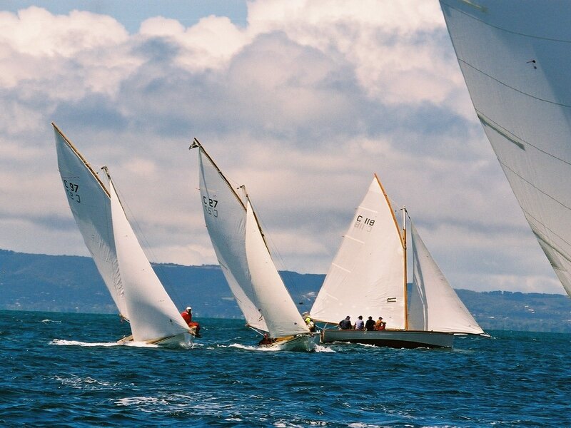 Sailboats racing on the water