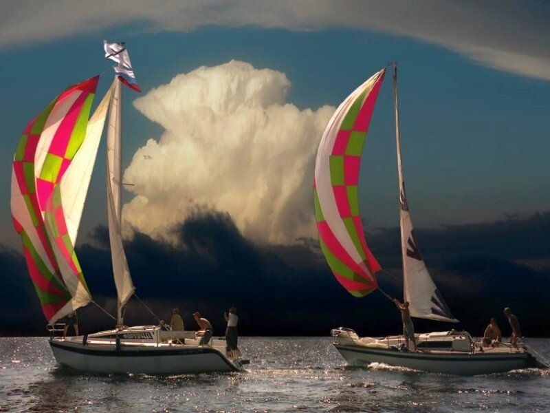 Sailboats with colorful sails