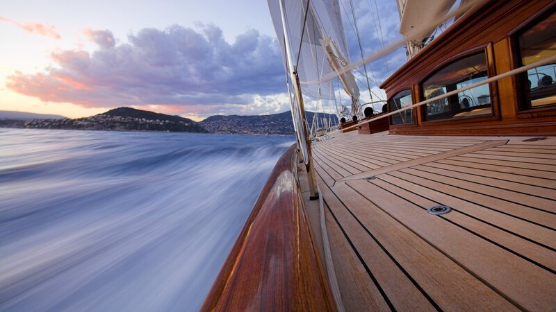 Sailing at sunset on a luxury yacht