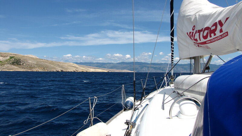 Sailing near a coastal island