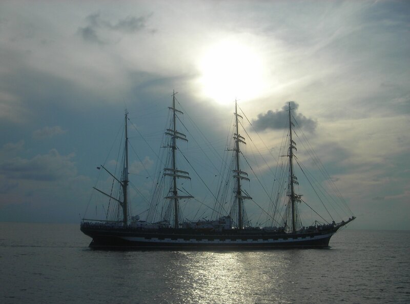 Sailing Ship at Sea — Blue, Dramatic, Sunset, Photograph, Sky
