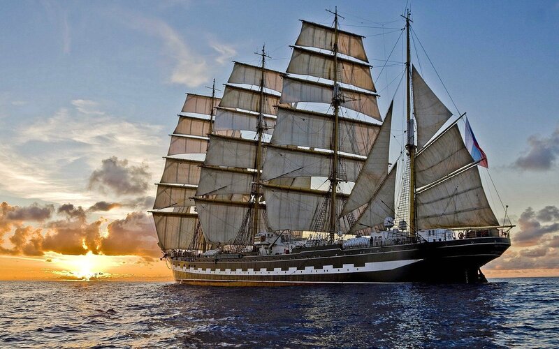 Sailing Ship at Sea — Blue, Serene, Sunset, Photograph, Ocean, Sky