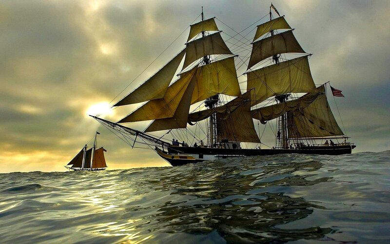 Sailing Ship at Sea — Yellow, Dramatic, Sunset, Photograph