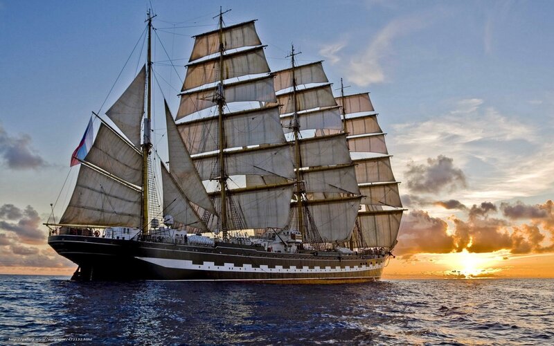 Sailing ship at sunset
