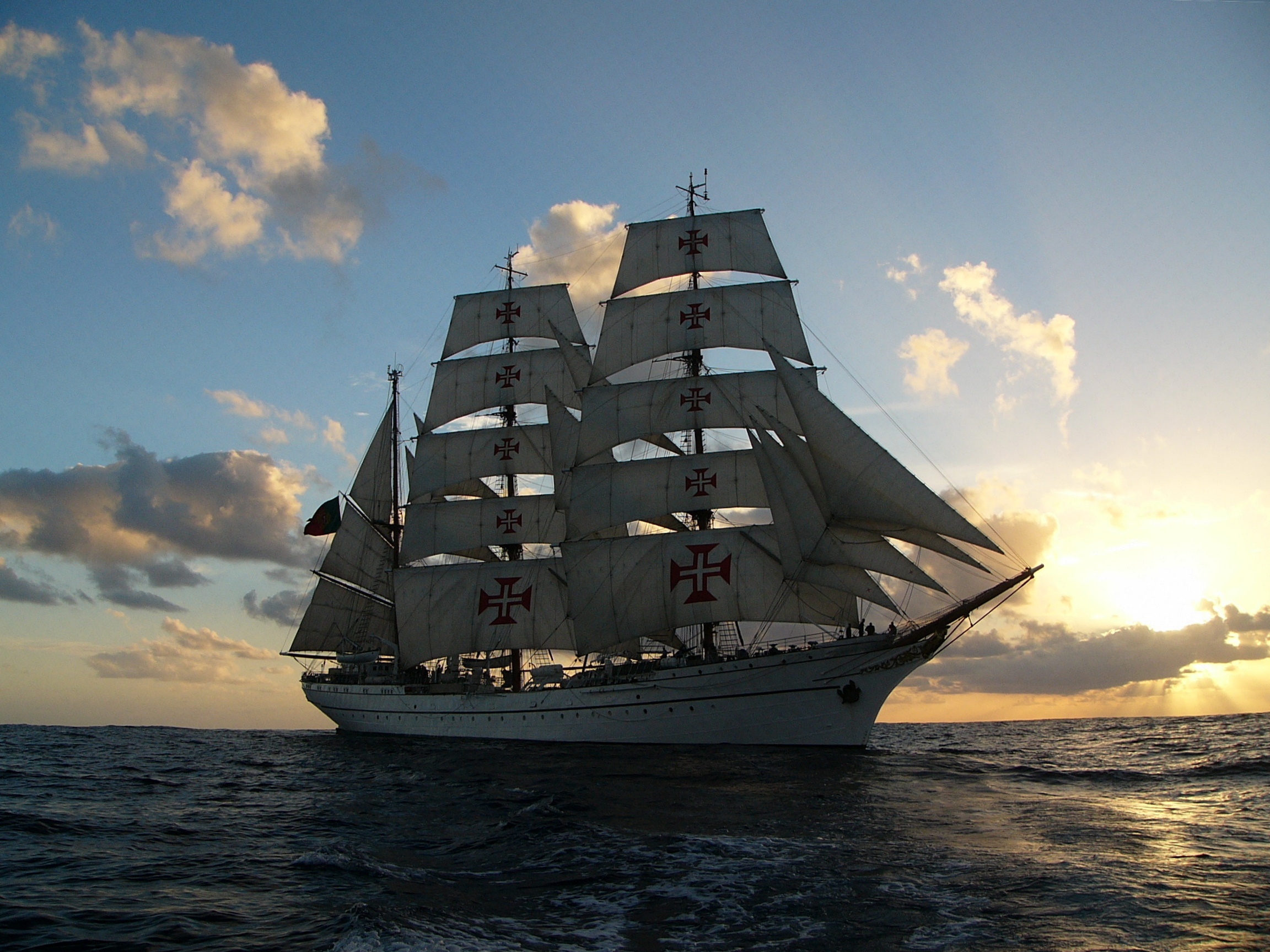 Sailing ship at sunset