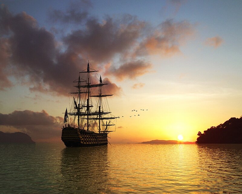 sailing ship at sunset