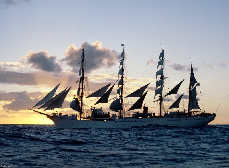 Sailing ship at sunset