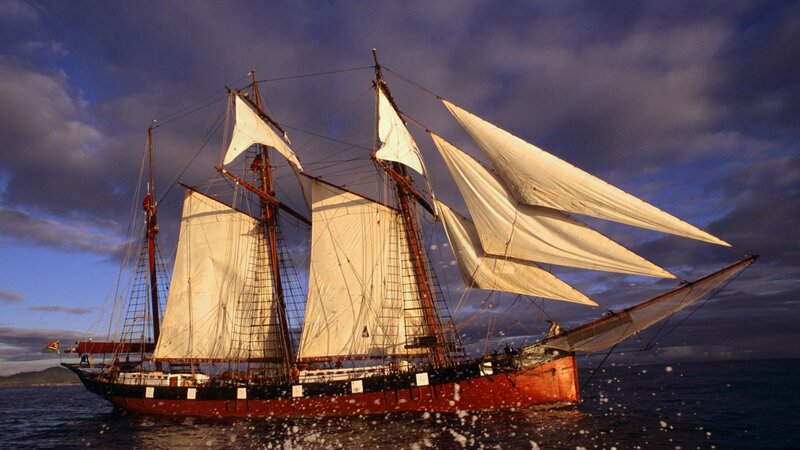 sailing ship at sunset