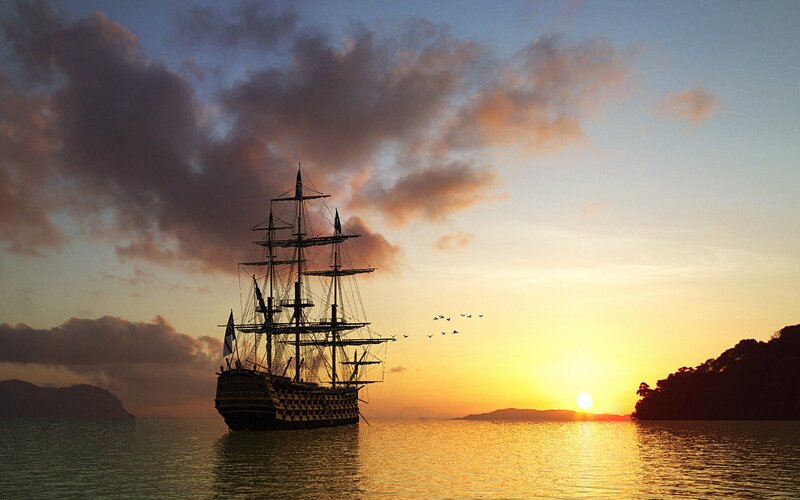 sailing ship at sunset