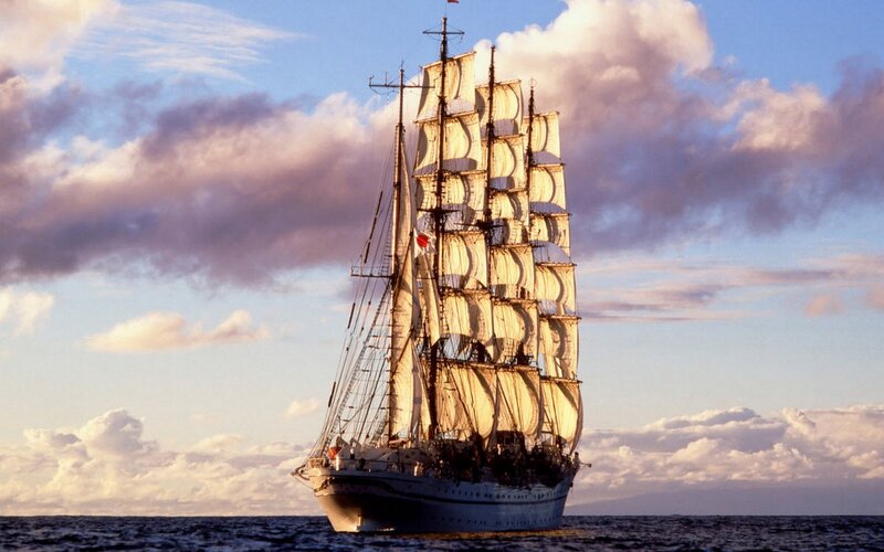 Sailing ship at sunset