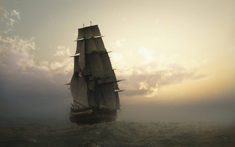 sailing ship at sunset