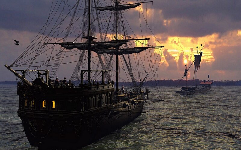 sailing ship at sunset