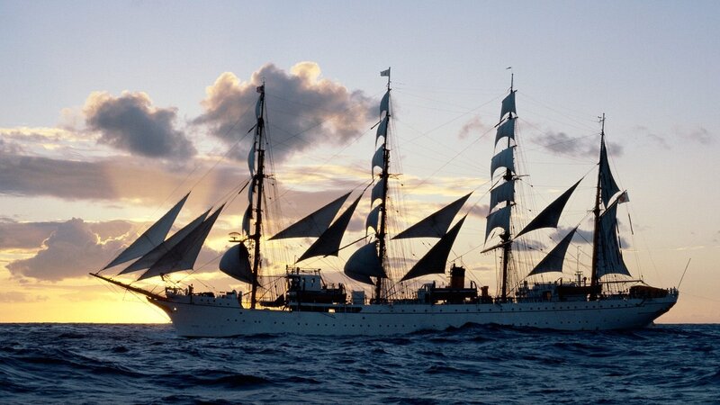 sailing ship at sunset