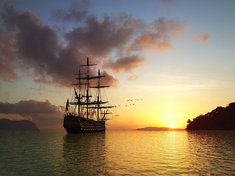 sailing ship at sunset