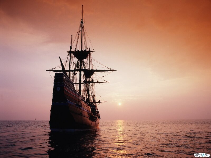 sailing ship at sunset