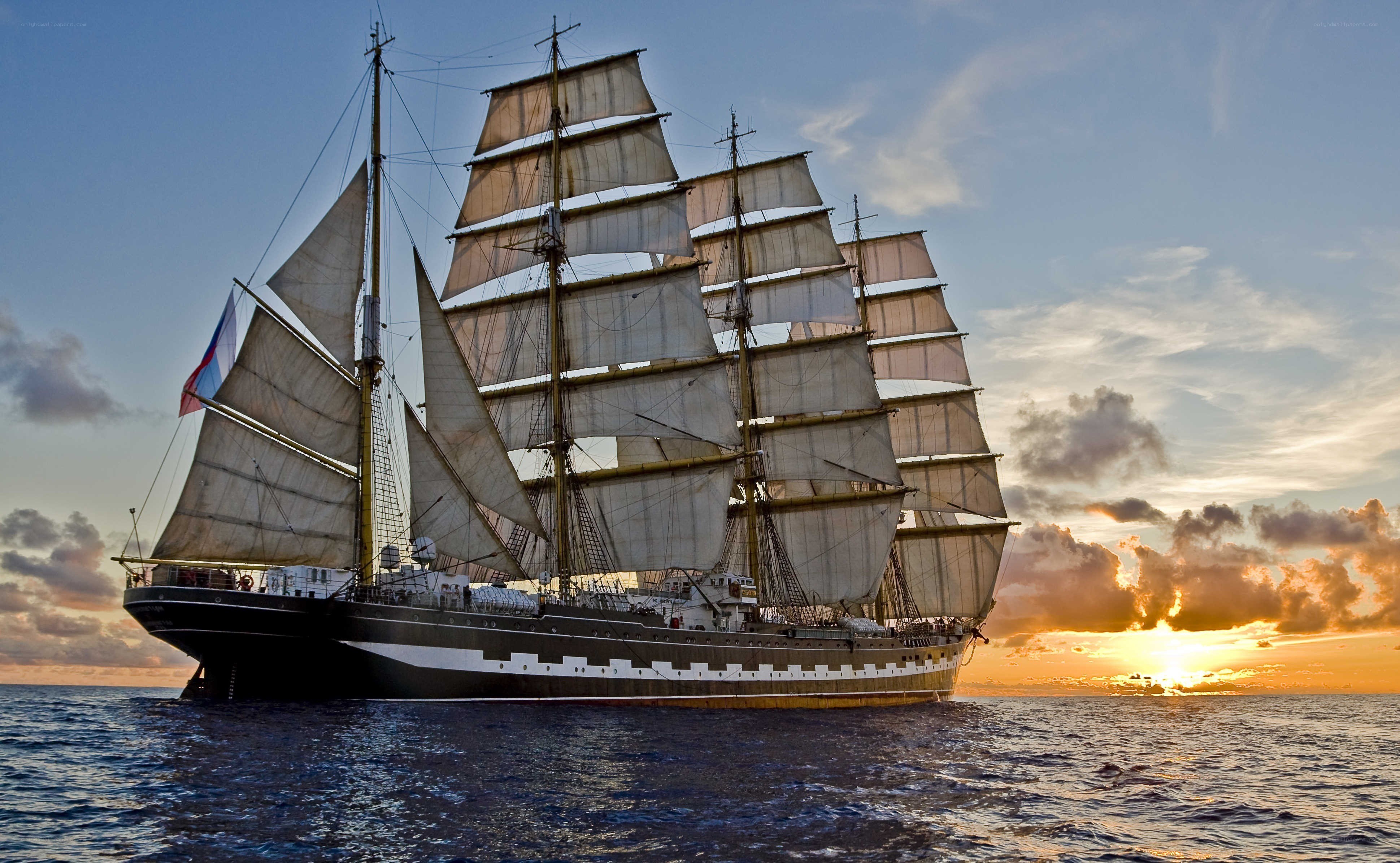 Sailing ship at sunset