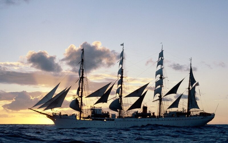 sailing ship at sunset