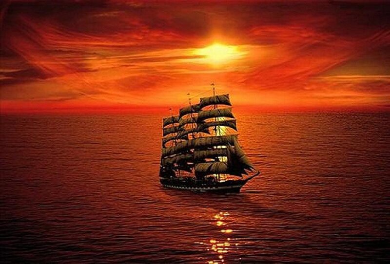 Sailing ship at sunset