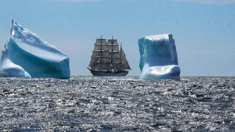 Sailing Ship Between Icebergs