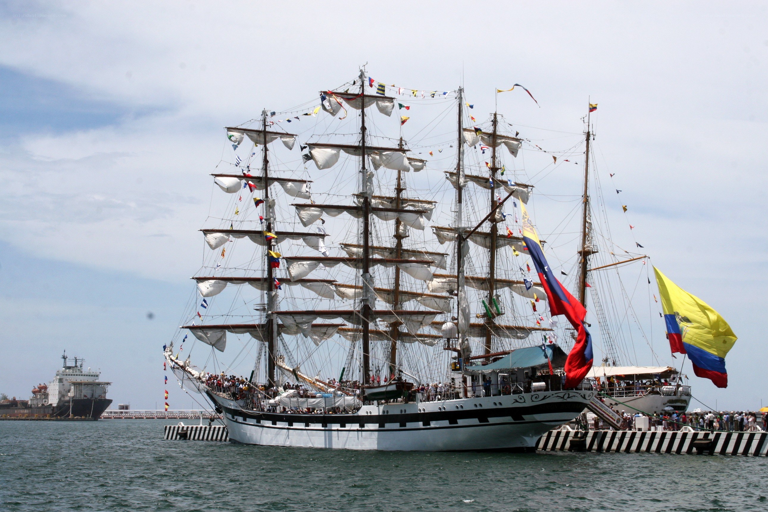 Sailing ship docked at port