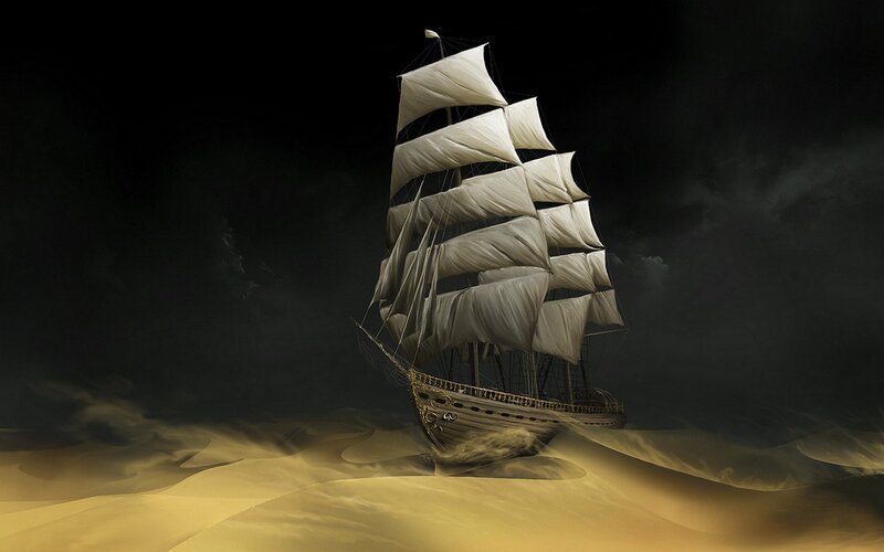 sailing ship in desert